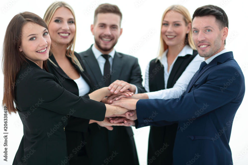 closeup.smiling business team with hands clasped together closeup.smiling business team with hands clasped together