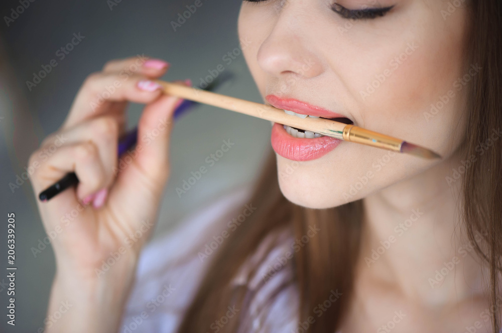 Close up view of female artist painting picture Close up view of female artist painting picture