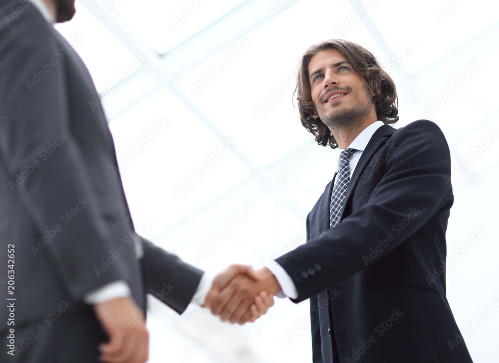 Close up image of business handshake at meeting. Close up image of business handshake at meeting.