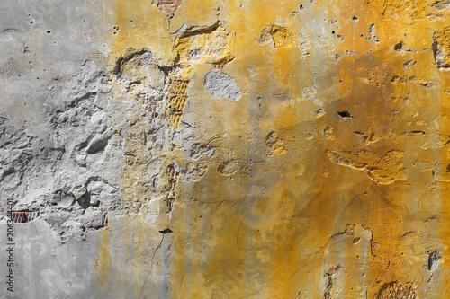 Old cracked cement wall background with rusty stains