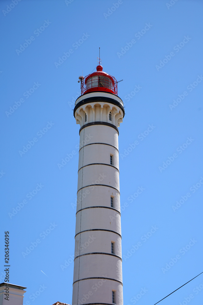 Lighthouse with lighthouse house on the Iberian Peninsula in spring

