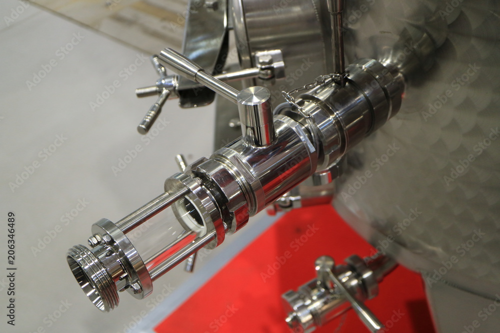 The valve on the container for storage of food liquids.