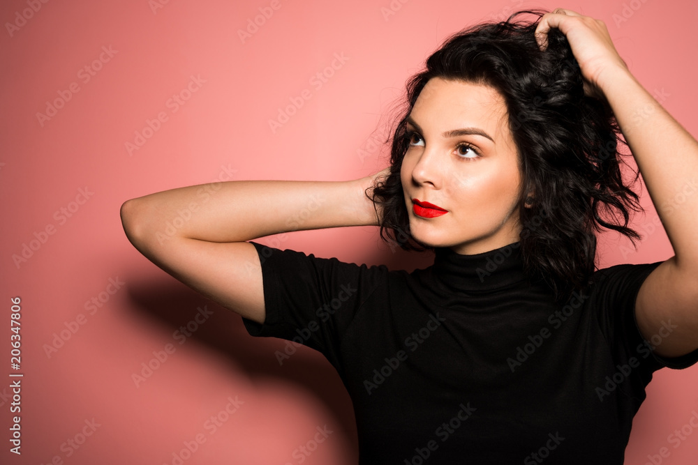 Young women on pink background Young women on pink background