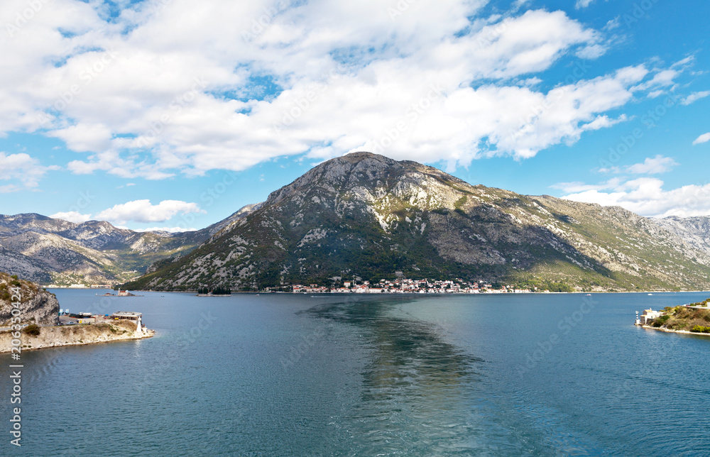 Montenegro. Boka Kotor Bay. View from the water on the coastlines and the beautiful Perast town