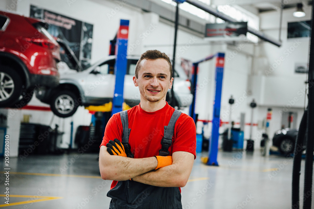 Mechanic work in car service. Mechanic work in car service.