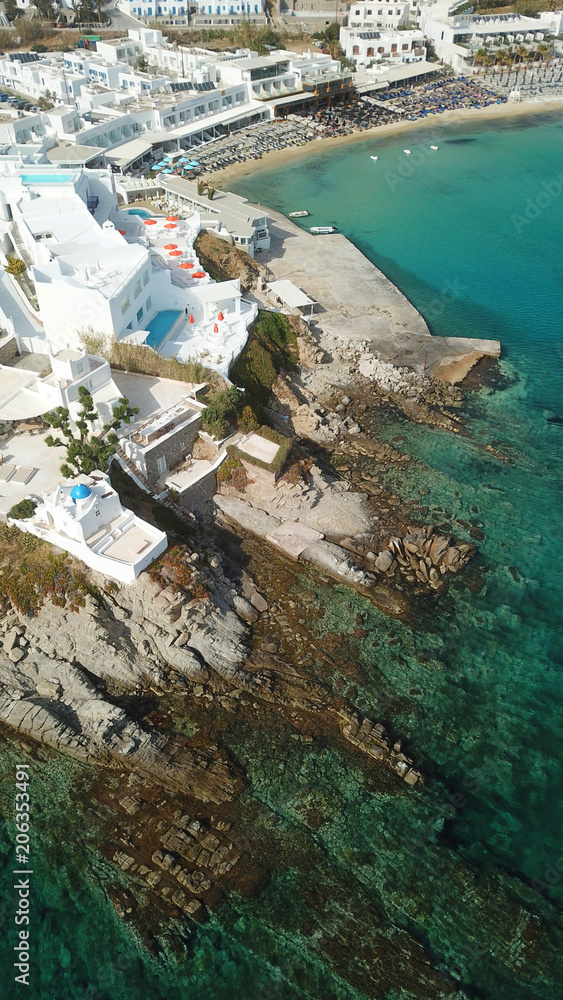 Aerial drone, bird's eye view photo of famous area and beach of Platy Gialos, Mykonos, Cyclades, Greece