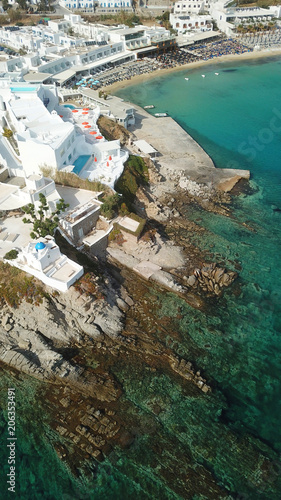 Aerial drone, bird's eye view photo of famous area and beach of Platy Gialos, Mykonos, Cyclades, Greece