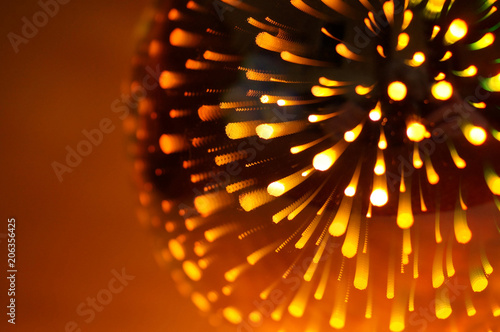 Shining light bulb with firework effect. Abstract background