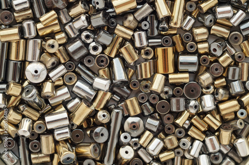 Shiny metallic hematite cylindrical beads background