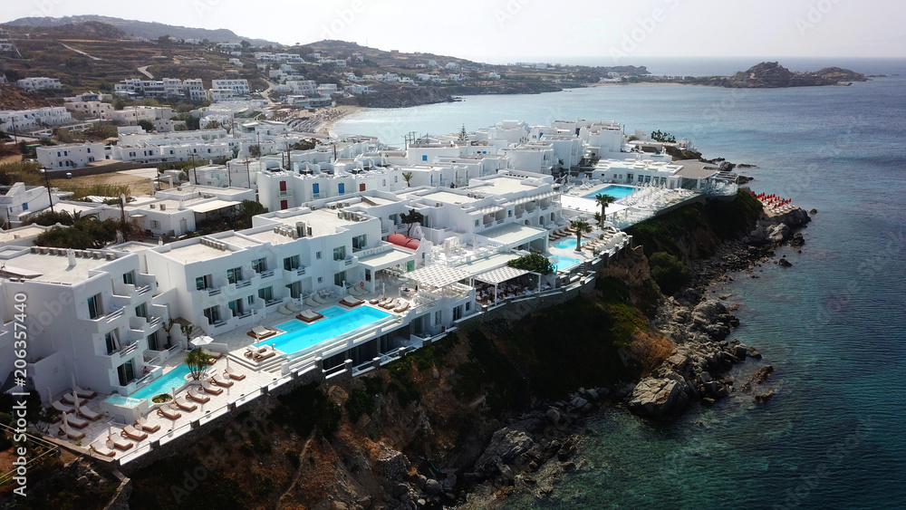 Aerial drone photo of famous Nissaki Boutique Resort in iconic island of Mykonos, Platy Gialos, Cyclades, Greece