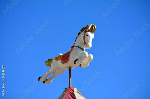 Merry-go-round carousel white horse © Barbo333