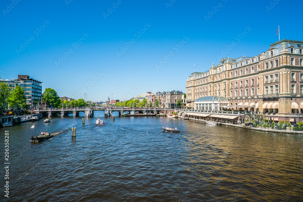 Amsterdam, May 7 2018 - the famous five star Amstelhotel at the river Amstel in summertime