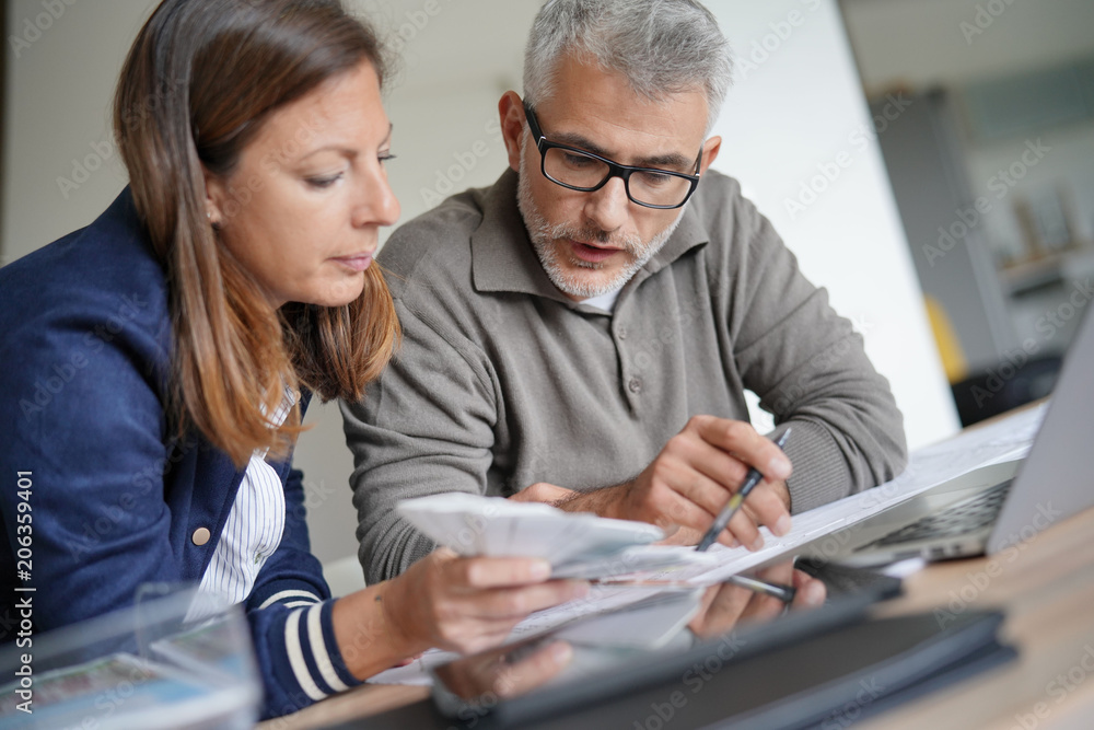 Designer and architect working together on project Designer and architect working together on project
