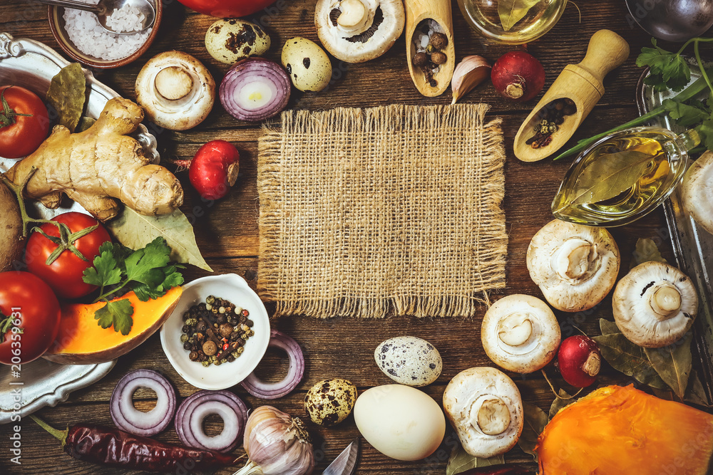 food ingredients. spice. cooking. place for text on a piece of burlap. food background. food ingredients. spice. cooking. place for text on a piece of burlap. food background.