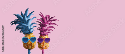 Couple pineapples on pink background minimal summer love concept