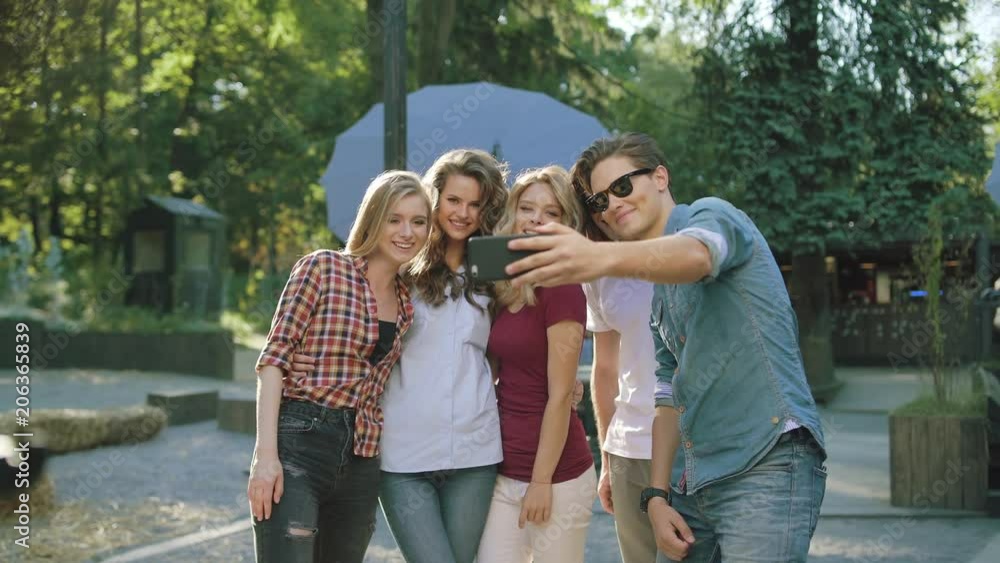 Happy Friends Taking Photos And Having Fun On Weekend Happy Friends Taking Photos And Having Fun On Weekend