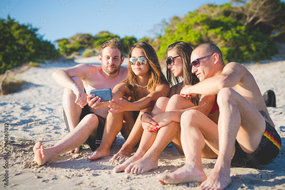 group of young multiethnic friends beach summer group of young multiethnic friends beach summer