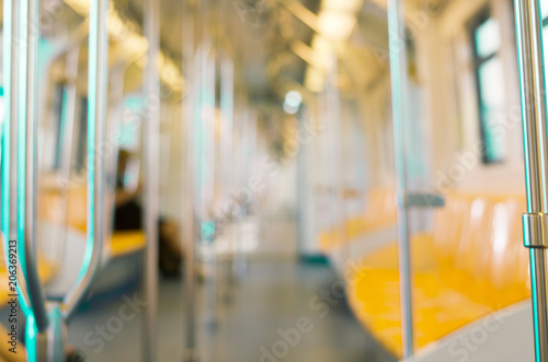 blur empty people in sky train in long holiday abstract background modern public transportation.