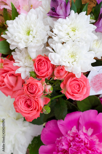 Multicolored bouquet for holiday  St. Valentine s day  wedding  birthday. Vertical photo.