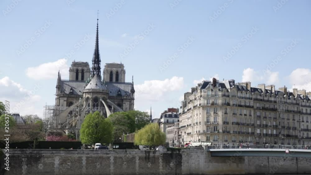 Notre Dame Cathedral in Paris in France, Europe - sunny day Notre Dame Cathedral in Paris in France, Europe - sunny day