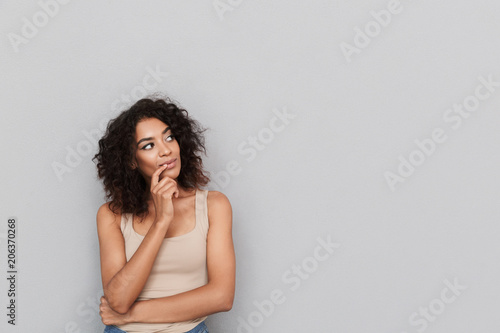 Bild auf Leinwand Portrait of a pensive young african woman