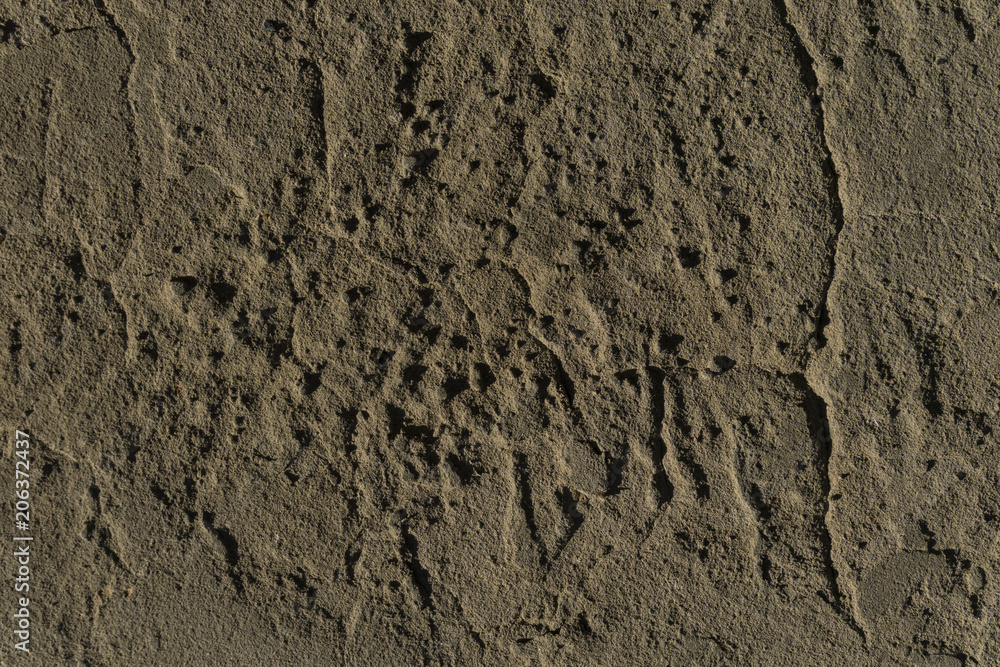 background, texture - brown clay wall with bumps and cracks background, texture - brown clay wall with bumps and cracks