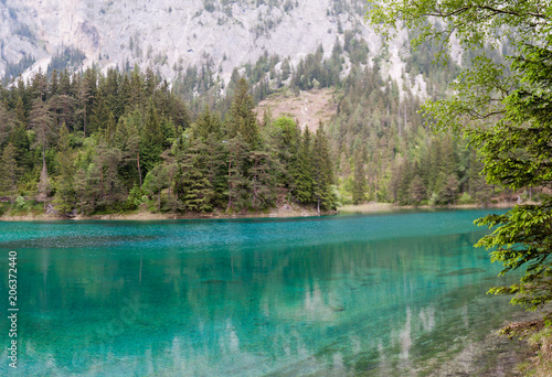 Turquoise colored lake in the heart of Austria