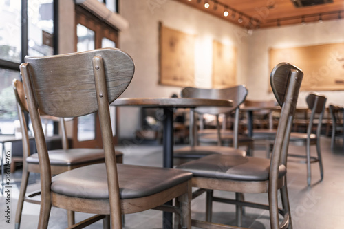 Modern interior of coffee shop decorate with wooden furniture © F16-ISO100
