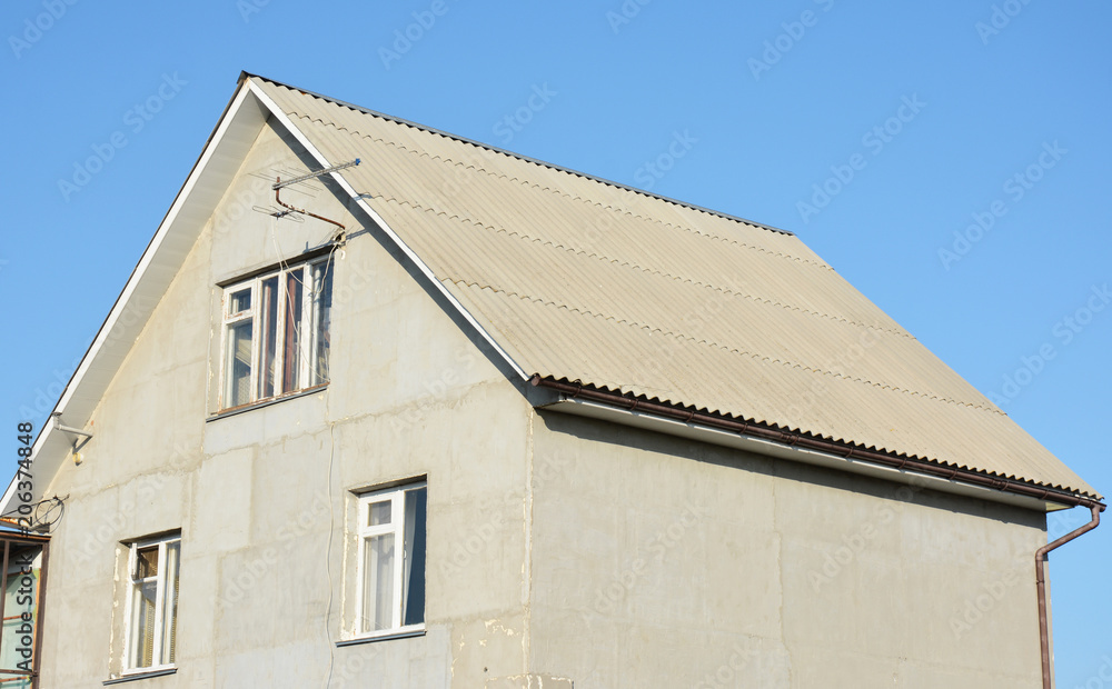 Asbestos roof with house plastering walls renovation.