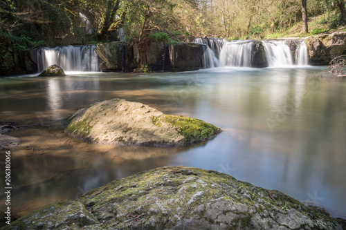 long exposure of a lake and waterfalls in the natural park of  Monte Gelato  40 km away from Rome  Italy