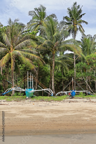 Blue local bangka boats stranded-southern end of Sugar Beach. Sipalay-Philippines. 0474 © rweisswald