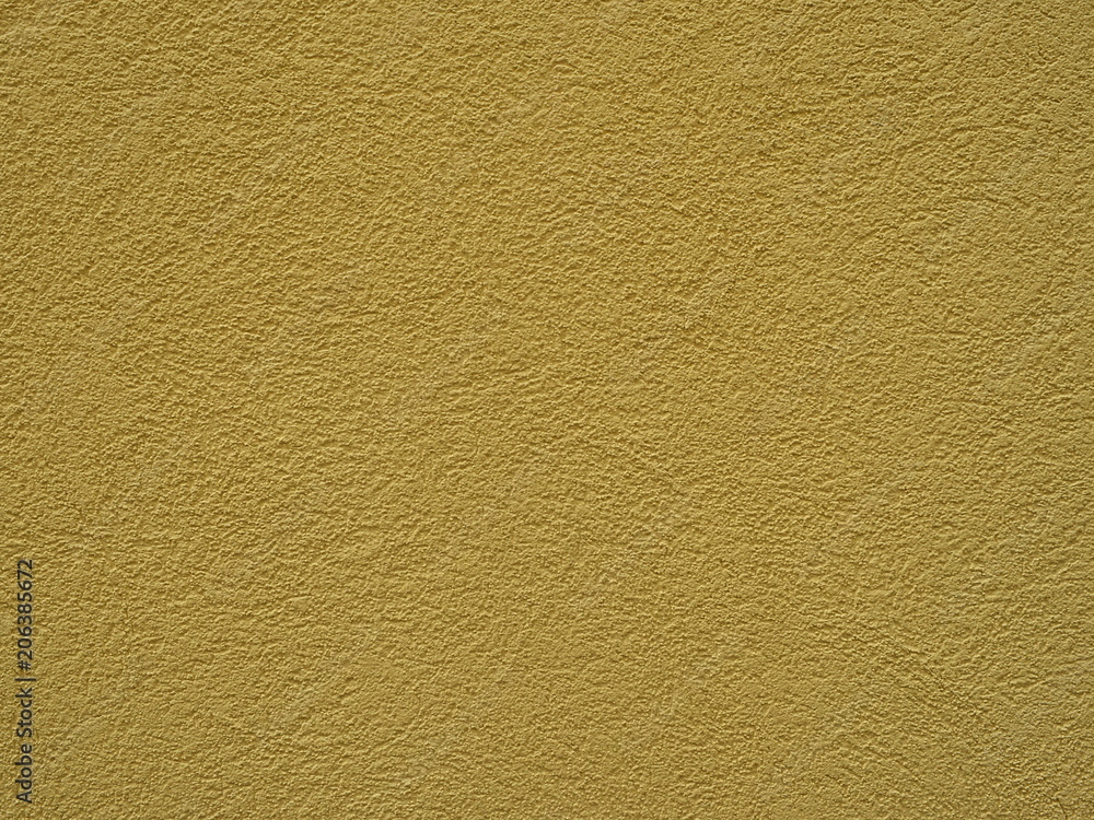 Brown plastered concrete wall background Brown plastered concrete wall background