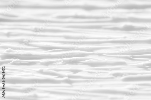 Texture of a paint of white color with patterns. Background with divorces for various purposes.