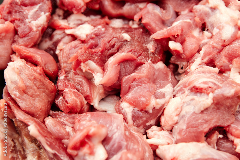 raw meat piece of pork or beef close up top view raw meat piece of pork or beef close up top view