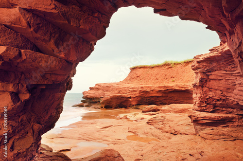 Red rock caves on the northern Prince Edward Island coast photo