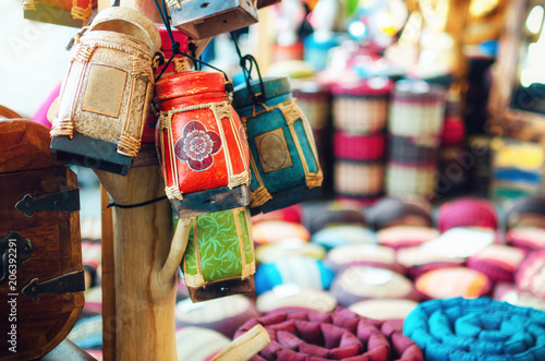 Traditional handcrafted thai rice boxes hanging from a market stall