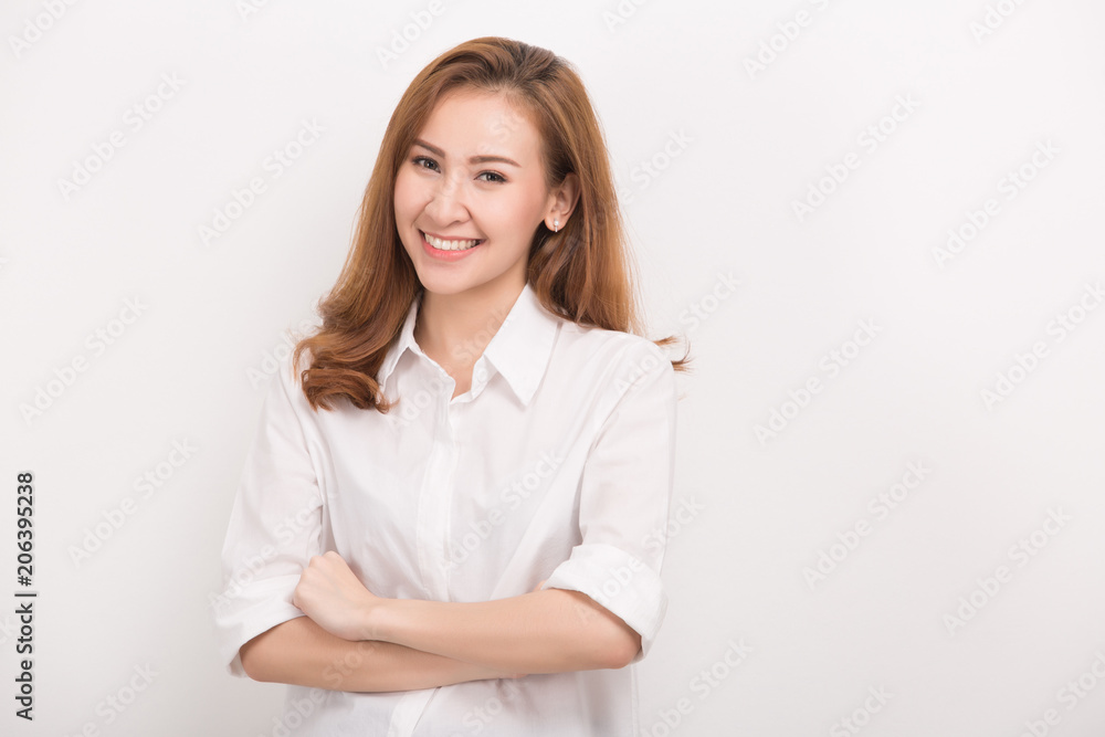 Smiling woman with crossed arms. Portrait isolated on white background. Smiling woman with crossed arms. Portrait isolated on white background.