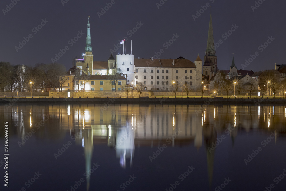 Panorama of the night Riga, capital of Latvia. Riga Castle night view Panorama of the night Riga, capital of Latvia. Riga Castle night view