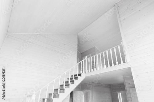 Stairway goes up, empty new wooden house