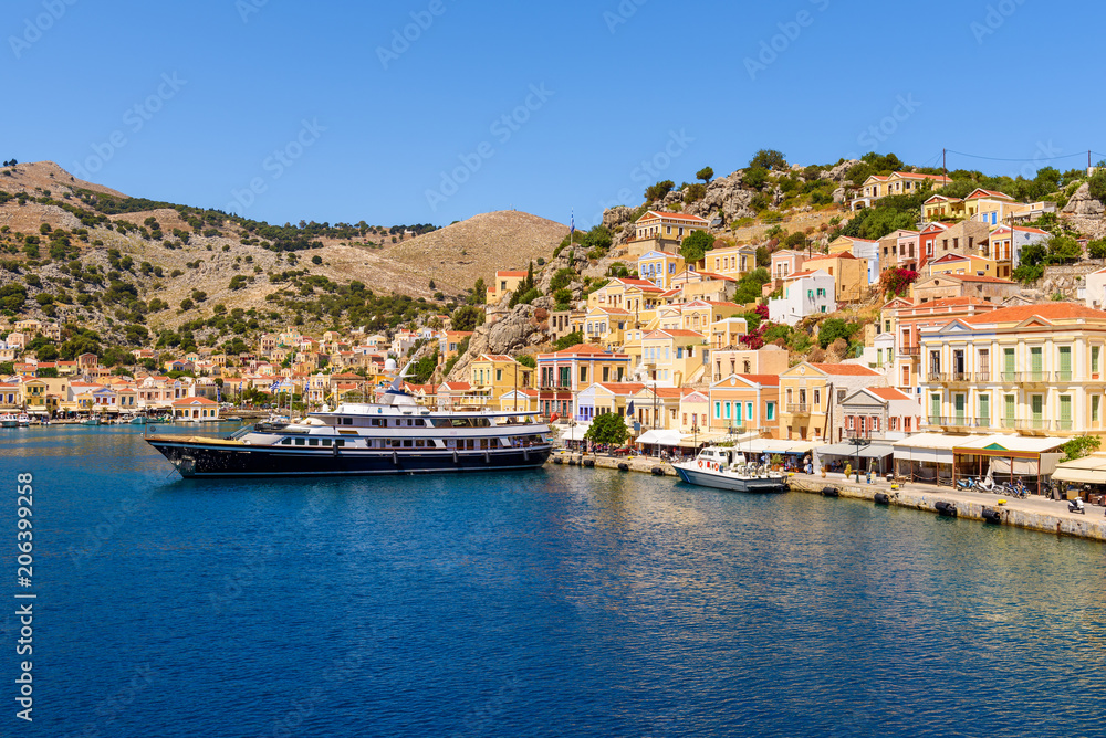 View of Gialos Harbor and beautiful island of Symi. Greece View of Gialos Harbor and beautiful island of Symi. Greece