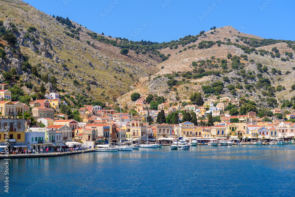 View of bay and beautiful architecture of Symi Island. Greece