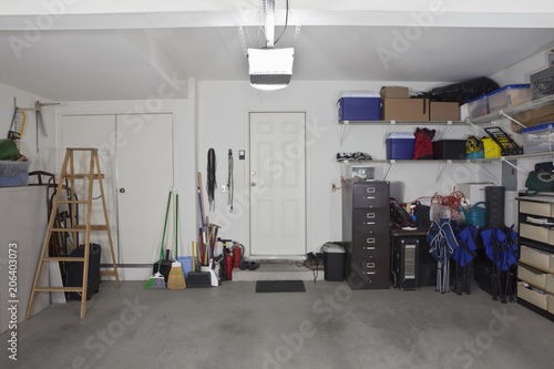 Photo Clean two car garage in a normal suburban home.