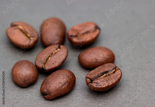 Coffee beans isolated on gray background.