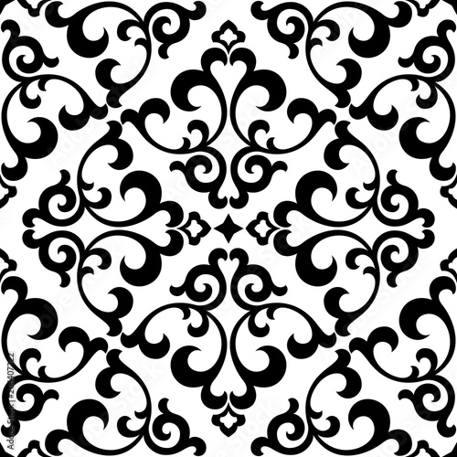 Wallpaper in the style of Baroque. A seamless vector background. White and black floral ornament. Graphic pattern for fabric, wallpaper, packaging. Ornate Damask flower ornament