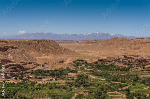 The beautiful valley of Ait Benhaddou with the Atlas mountains in the background