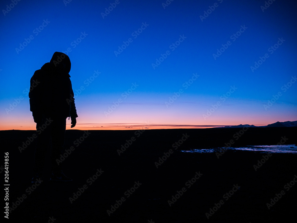 Fototapeta premium Guy looking away into the horizon
