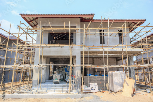 house under construction with autoclaved aerated concrete block structure at building site