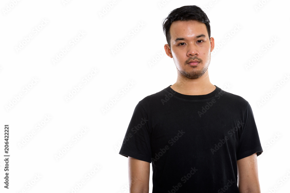 Studio shot of young Asian man Studio shot of young Asian man