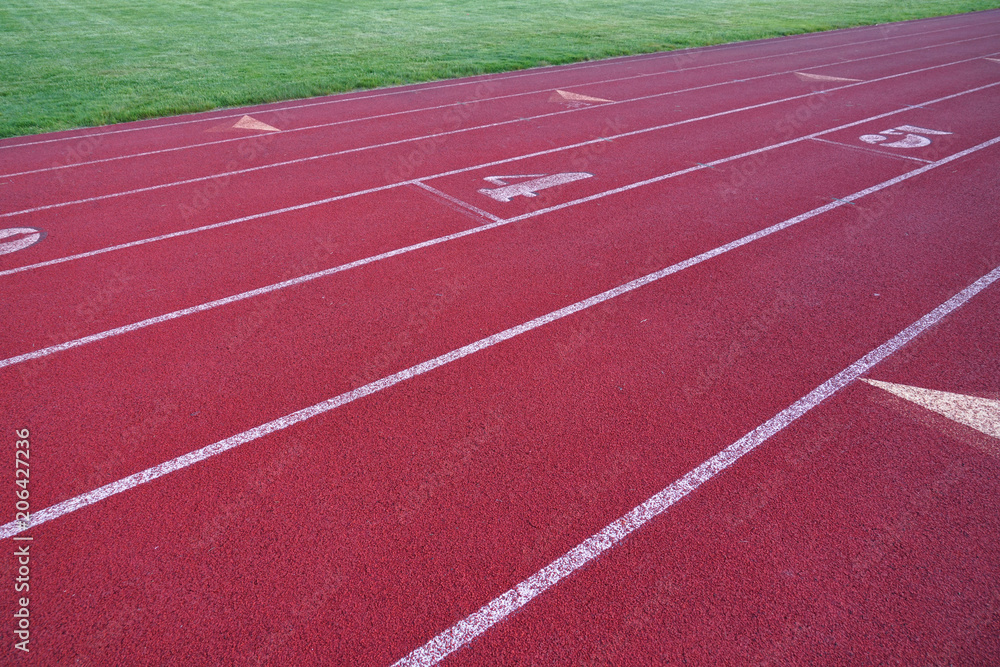 Fototapeta premium red outdoor running track in sport field