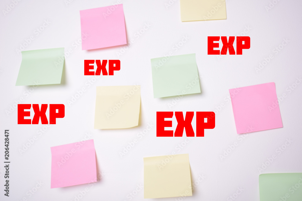 Stickers on the wall with the inscriptions:EXP